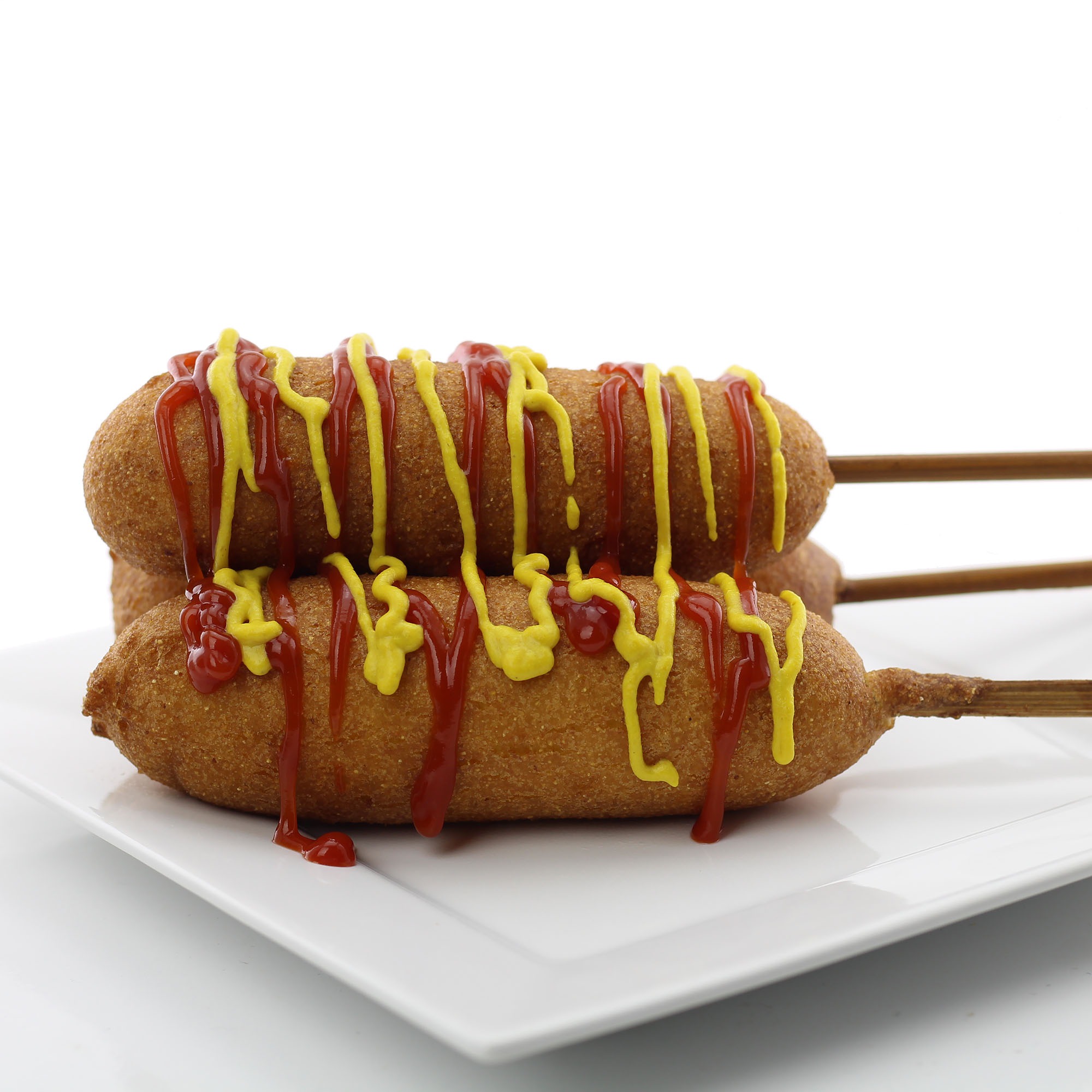 Who invented corn dogs?